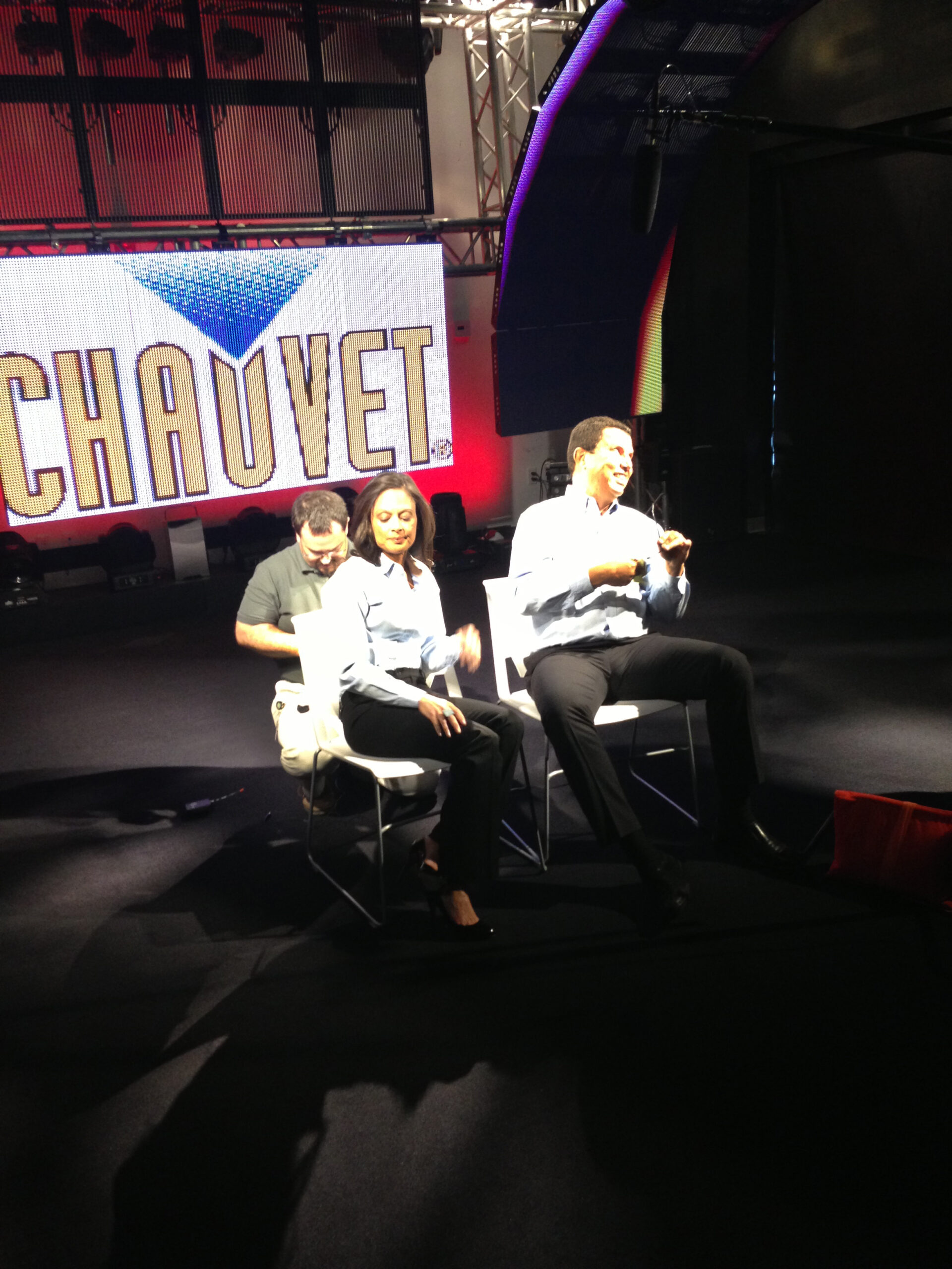 Chauvets getting miked in front of CHAUVET  Professional VIP video products under a full Chauvet rig.